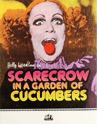 Scarecrow In a Garden of Cucumbers