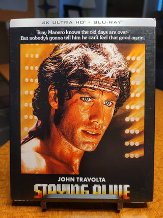 Staying Alive [4K/UHD + Blu-ray w/ Slipcover] *PRE-OWNED*