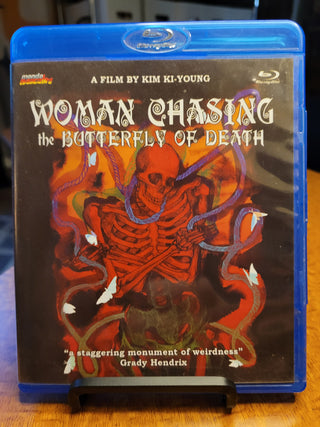 Woman Chasing the Butterfly of Death